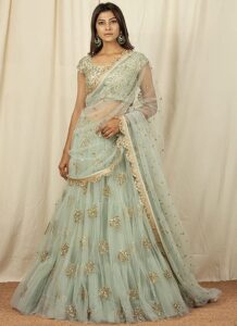 Mint green net lehenga with sequins embroidery wedding wear