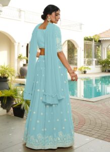 Sky blue faux georgette sequins umbrella lehenga set back view