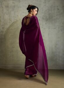 Wine faux chiffon saree with stone-embellished border back view