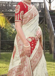 Offwhite and Red Benarasi Art Silk Saree with silver zari work closeup view